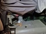 an image of a sewing machine with clothes on it