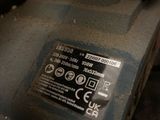 a close up of a car ' s engine with a sticker on it