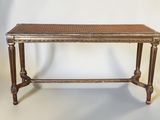 an image of a table with a rattan top on a white background