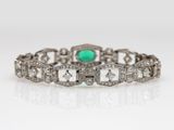 an art deco diamond and emerald bracelet