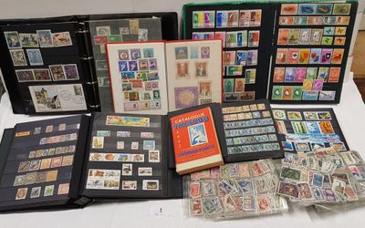many different types of stamps on display on a table