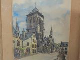 une photo d'un tableau représentant une église, dans un cadre