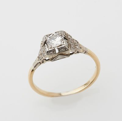 an old cut diamond ring with an old cut diamond in the center