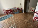 a room that has a table and chairs in it