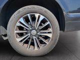 a close up view of a car ' s wheel and tire