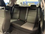 the back seats of a car in a car showroom