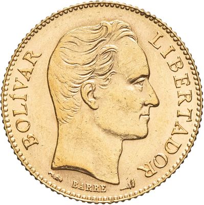 un gros plan d'une pièce d'or représentant le profil d'un homme
