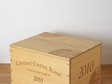 a wooden box that has a wine bottle inside of it