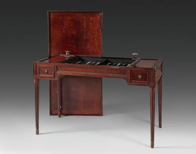 an antique writing desk with drawers and drawers