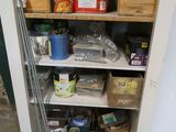 a pantry with a lot of food on the shelves