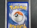 a close up of a pokemon card with a white ball on it