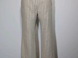 an image of a mannequin with a white shirt and striped pants