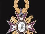 a close up of a medal on a black background with a black background