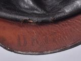 a close up of a pair of shoes with a leather sole