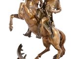 statue en bronze représentant un homme à cheval accompagné d'un autre homme à cheval