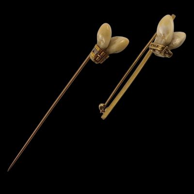 a pair of gold and pearl flower hair pins