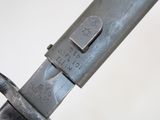 a close up of a knife with a metal handle