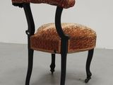 an image of a chair with a leopard print upholstered seat