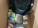 a box full of food that is sitting on the floor
