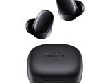 a pair of black earphones sitting on top of each other
