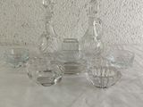 a lot of glass items that are on a table
