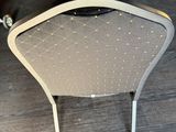 a chair that is sitting on the floor in the room