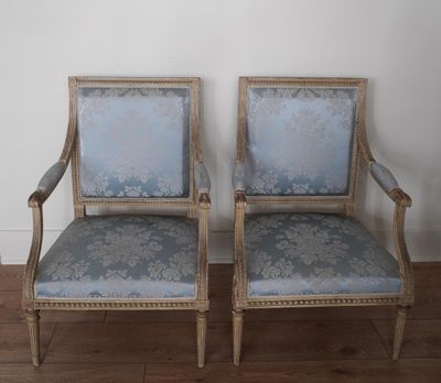 pair of blue upholstered chairs with floral upholstered upholstered upholstered upholstered upholstered upholstered upholstered uphol