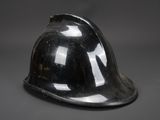an image of a black hard hat sitting on top of a table