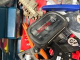 a blue container filled with assorted tools and tools
