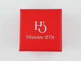 a close up of a red box with a white logo on it