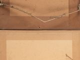 two pieces of cardboard that have been wrapped in barbed wire