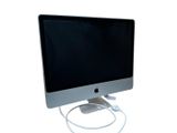 a computer monitor with a power cord attached to it