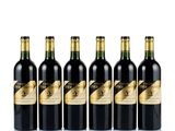six bottles of red wine lined up in a row