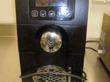 a coffee machine that is sitting on a counter
