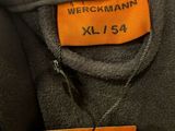 the label on the back of a jacket is clearly visible