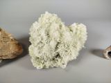 three different types of rocks on a white surface