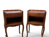 pair of nightstand tables with drawers on each side of each other