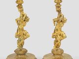 pair of antique brass candlesticks with cherenshes and cherenshes