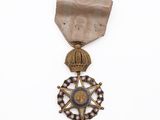 a close up of a medal with a star on it