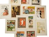 many different types of posters displayed on the wall