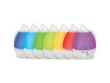 a close up of a row of toothbrushes in different colors