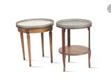 two small tables with a tray on top of them