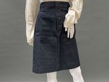 an image of a mannequin wearing a white blouse and blue denim skirt