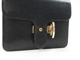 an image of a black purse on a white background