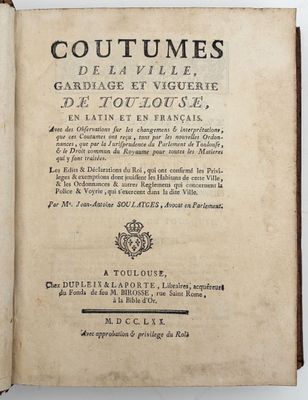 an open book with a black and white title on it