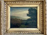 un tableau représentant un paysage avec des arbres dans un cadre doré
