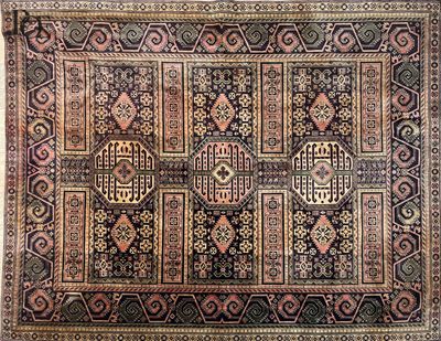 an antique persian rug with geometric design on a black ground
