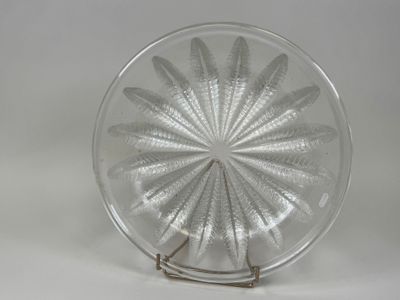 a glass plate with a circular design on it