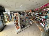 a picture of a store with a variety of products on the shelves