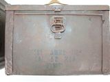 an old metal box with a metal latch on it